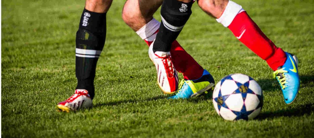 letsel bij voetbalwedstrijd, onrechtmatige sliding